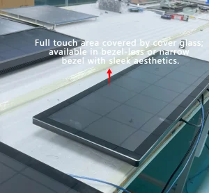 Factory shot of narrow bezel capacitive touch display, sleek zero-bezel design for digital signage