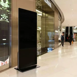 Floor standing digital signage with black screen in shopping mall, commercial LCD display failure example