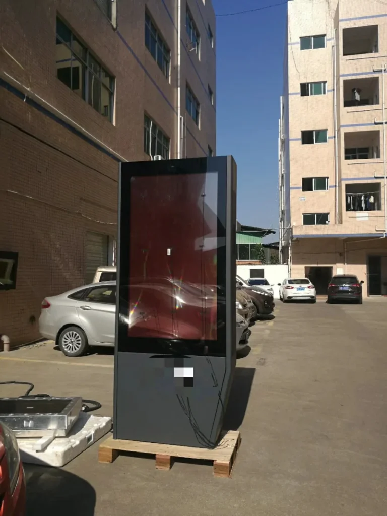 Floor standing vertical outdoor LCD advertising kiosk placed in factory yard, waterproof high brightness outdoor digital signage