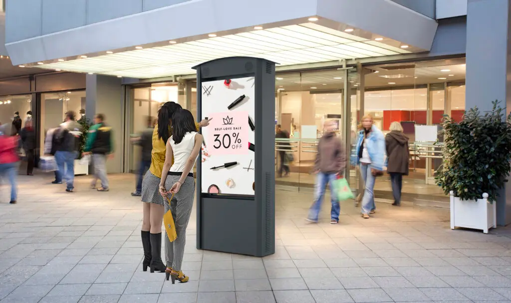 High brightness outdoor LCD digital signage kiosk at shopping mall entrance, clear screen view for retail advertisement