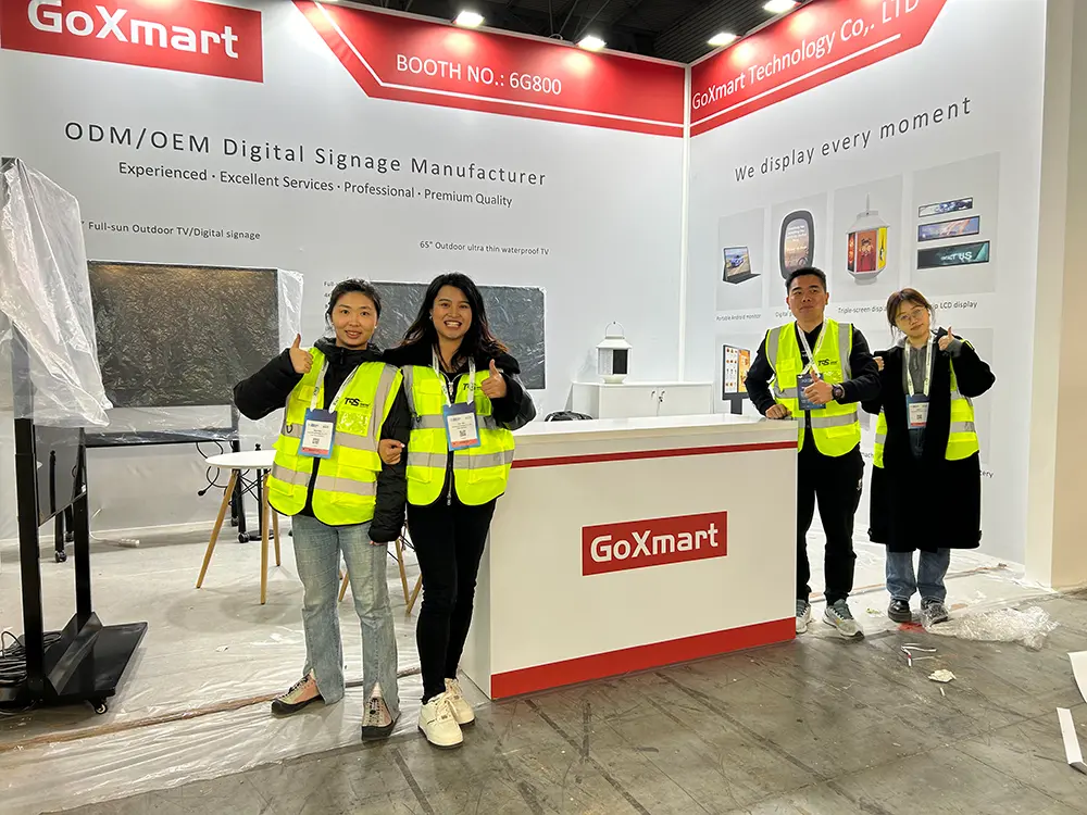 GoXmart team photo at ISE trade show booth after stand installation