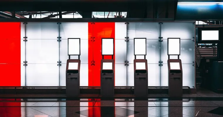 Self service interactive kiosks and digital signage in public transit station