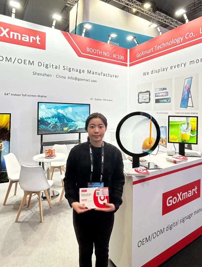 goxmart staff presents round lcd display and commercial screens at ISE trade show