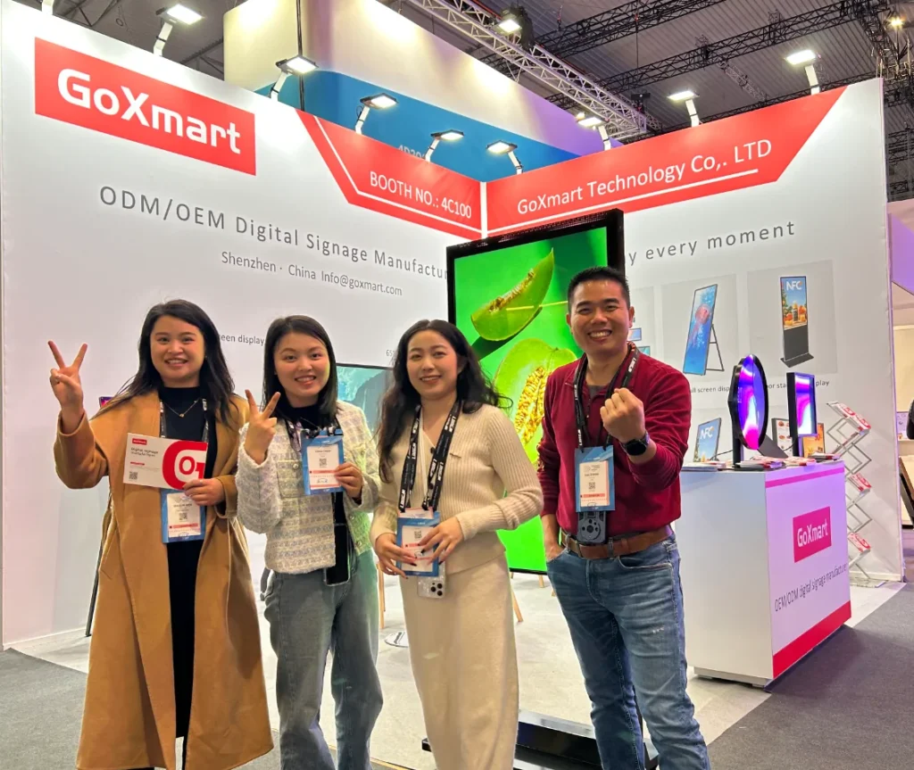 goxmart team photo at digital signage expo trade show, digital signage manufacturer booth