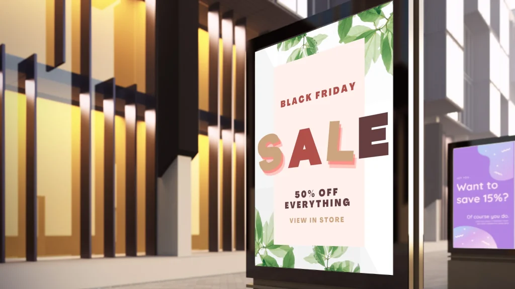 Outdoor digital advertising displays showing Black Friday sale promotion in shopping mall