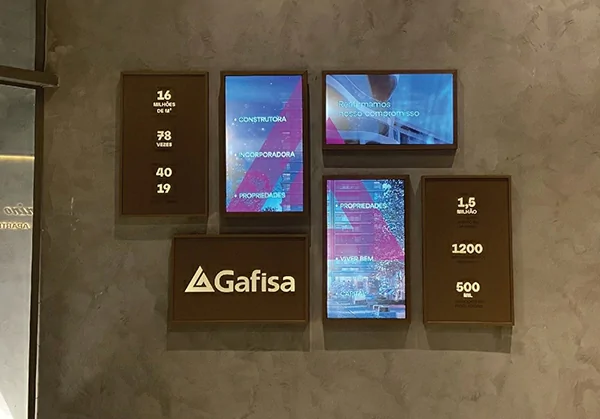 GoXmart indoor wall mounted digital signage, mixed-size wall digital screens on company brand reception wall